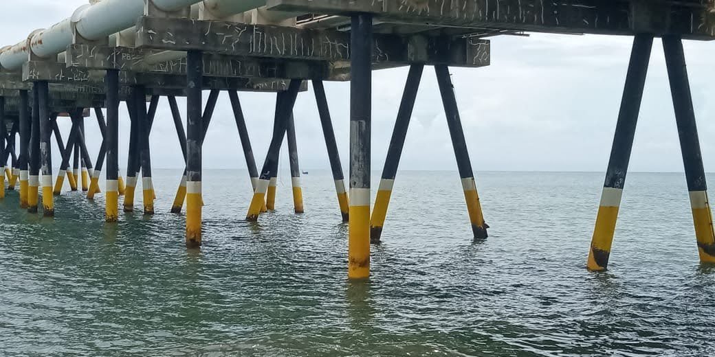 RECOATING STEEL PILE AT SEA WATER INTAKE UNIT-72